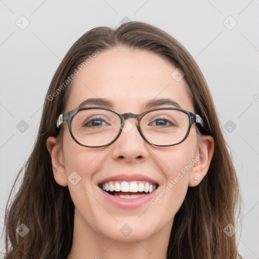 Joyful white young-adult female with long  brown hair and grey eyes