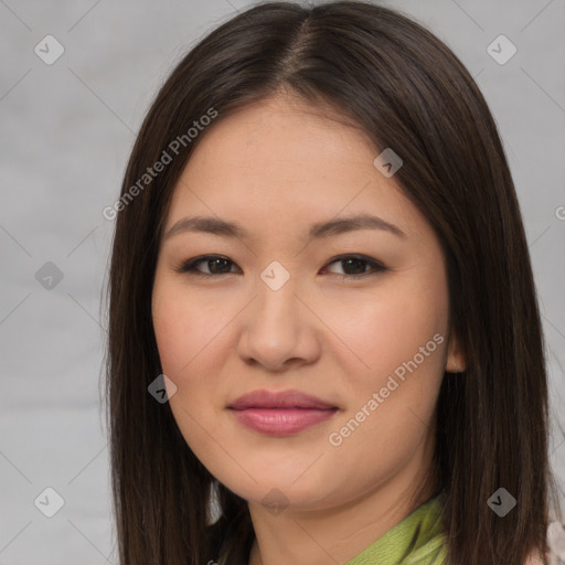 Joyful asian young-adult female with long  brown hair and brown eyes