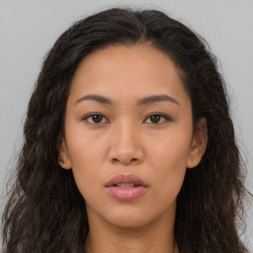 Neutral asian young-adult female with long  brown hair and brown eyes