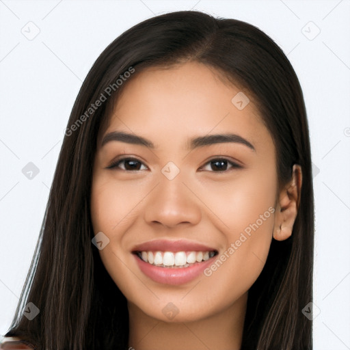 Joyful asian young-adult female with long  brown hair and brown eyes