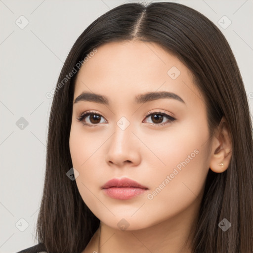 Neutral white young-adult female with long  brown hair and brown eyes