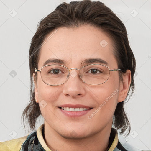 Joyful white adult female with medium  brown hair and brown eyes