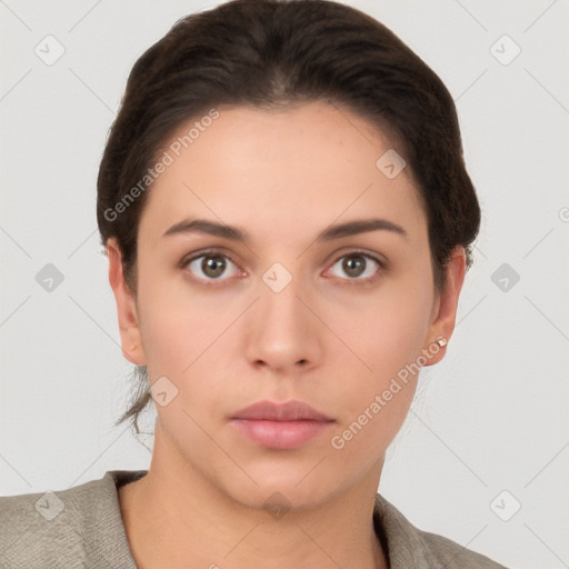 Neutral white young-adult female with short  brown hair and brown eyes