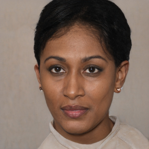 Neutral black young-adult female with short  black hair and brown eyes