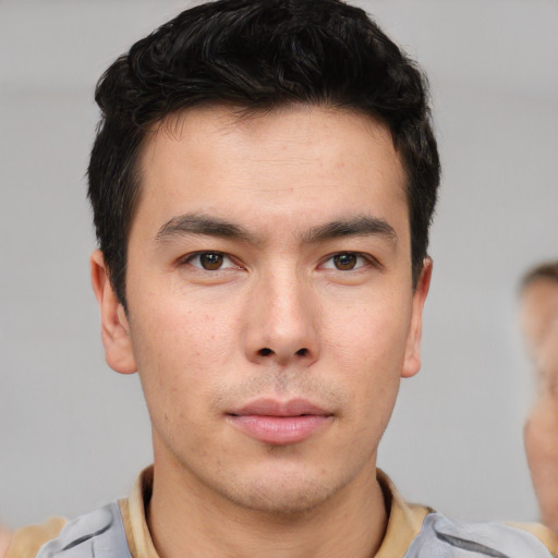 Neutral asian young-adult male with short  brown hair and brown eyes