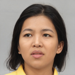 Neutral asian young-adult female with medium  brown hair and brown eyes