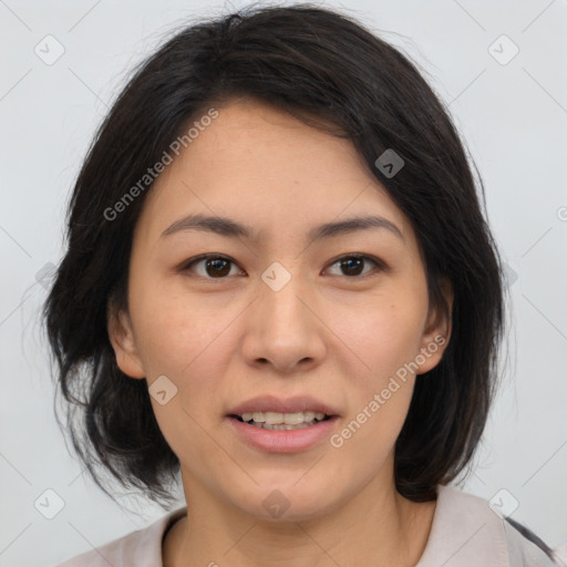 Joyful asian young-adult female with medium  brown hair and brown eyes