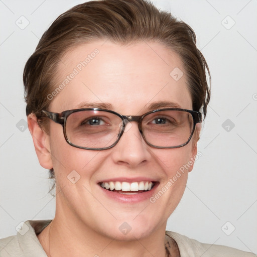 Joyful white young-adult female with medium  brown hair and blue eyes