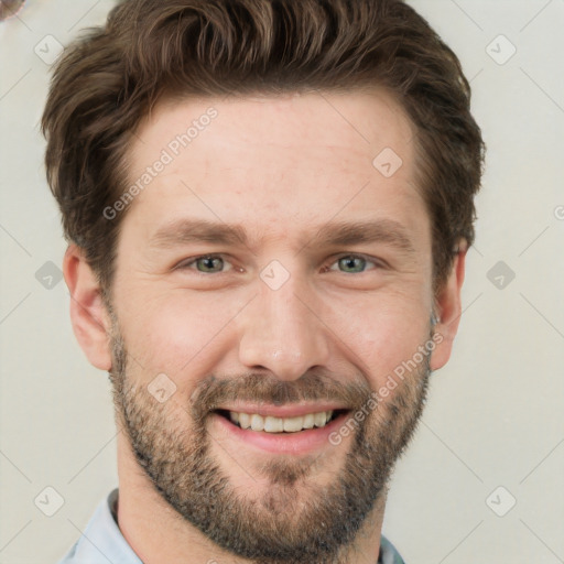 Joyful white adult male with short  brown hair and grey eyes