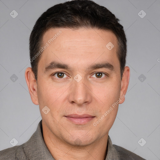 Joyful white adult male with short  brown hair and brown eyes