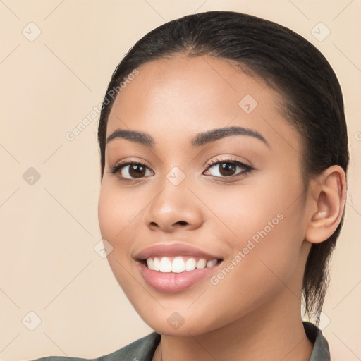 Joyful white young-adult female with long  brown hair and brown eyes