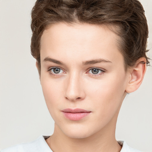 Neutral white young-adult female with short  brown hair and brown eyes