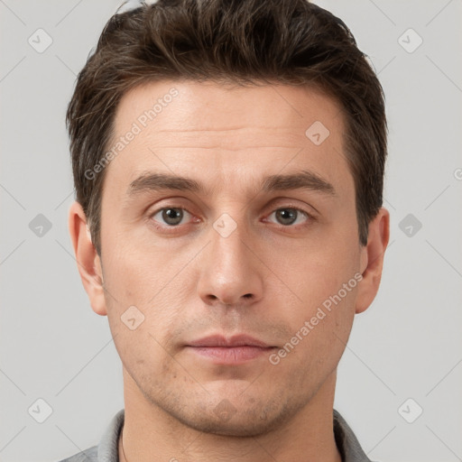 Neutral white young-adult male with short  brown hair and brown eyes