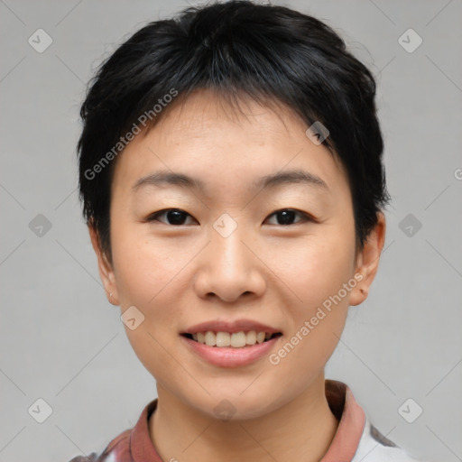 Joyful asian young-adult female with short  brown hair and brown eyes