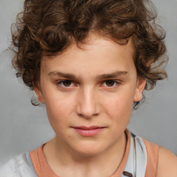 Joyful white child female with medium  brown hair and brown eyes