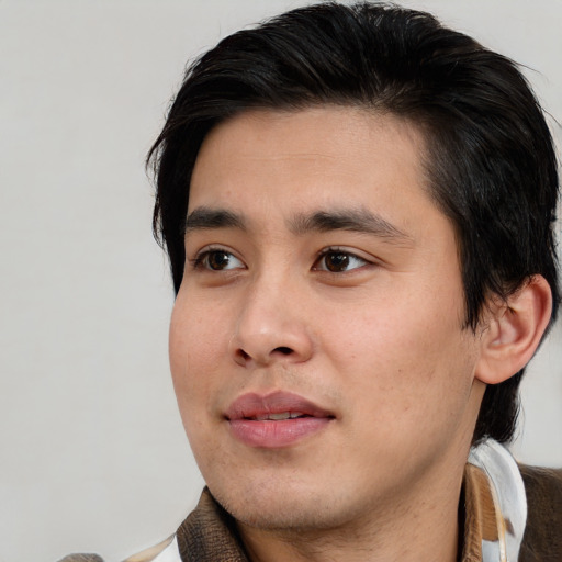 Neutral white young-adult male with medium  black hair and brown eyes