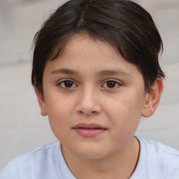 Joyful white child female with short  brown hair and brown eyes