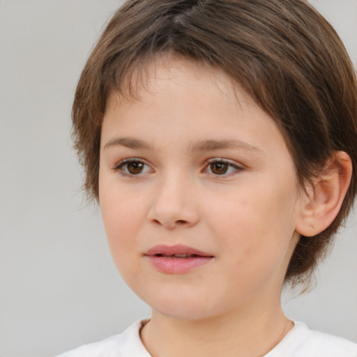 Joyful white child female with medium  brown hair and brown eyes