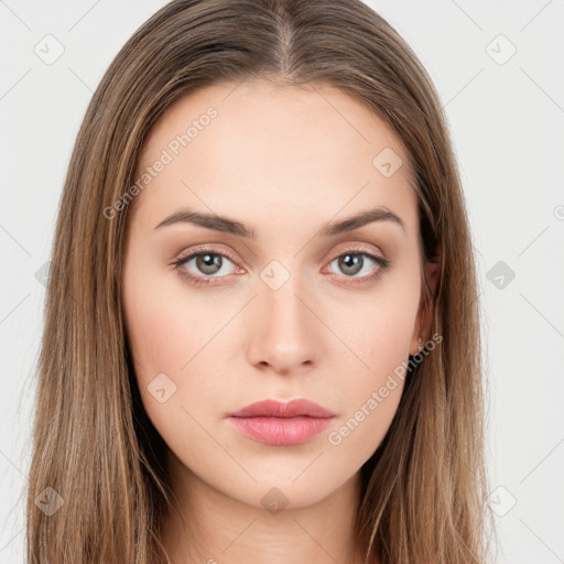 Neutral white young-adult female with long  brown hair and brown eyes