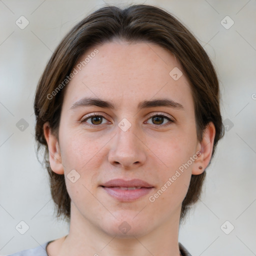 Joyful white young-adult female with medium  brown hair and green eyes