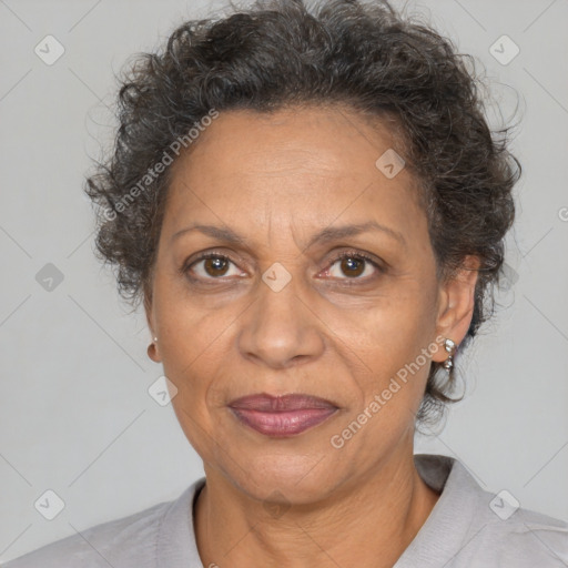 Joyful white adult female with short  brown hair and brown eyes