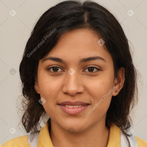 Joyful latino young-adult female with medium  brown hair and brown eyes