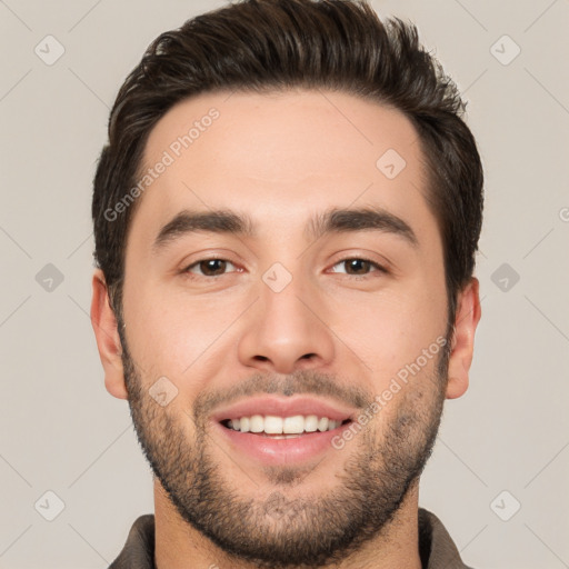 Joyful white young-adult male with short  black hair and brown eyes