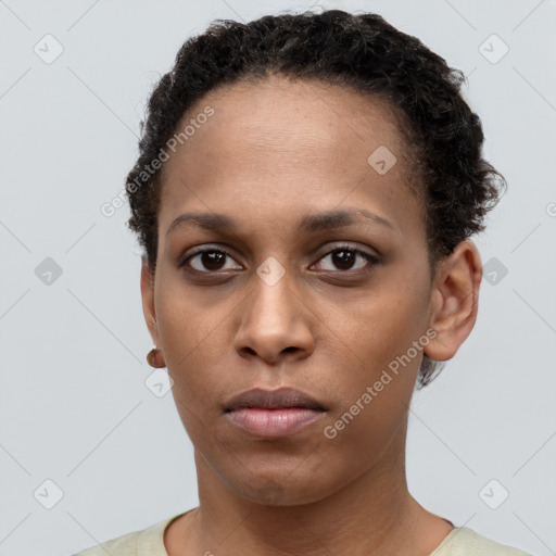 Neutral black young-adult female with short  brown hair and brown eyes