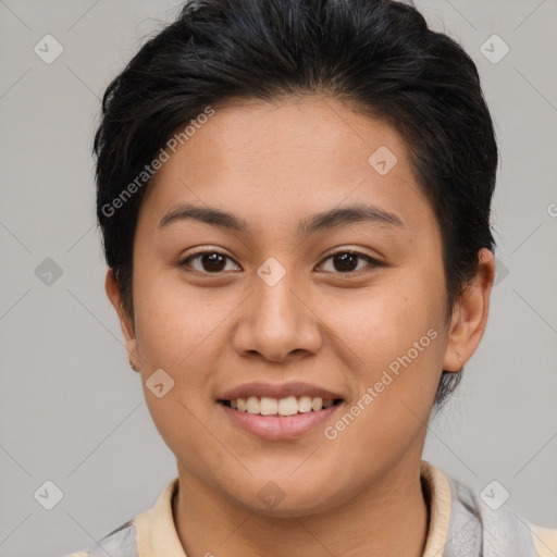 Joyful asian young-adult female with short  brown hair and brown eyes