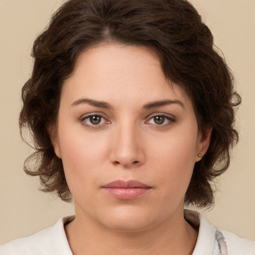 Neutral white young-adult female with medium  brown hair and brown eyes