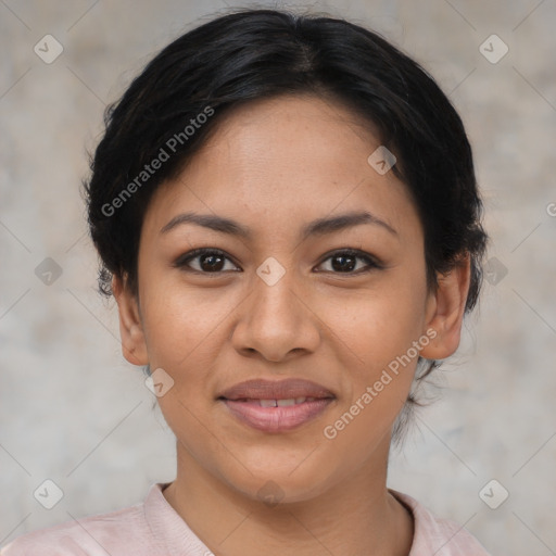 Joyful latino young-adult female with short  brown hair and brown eyes