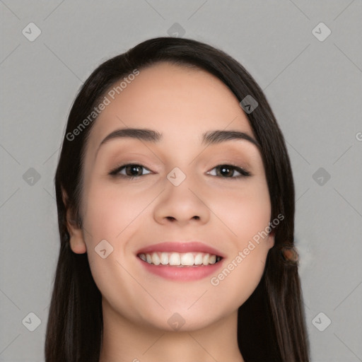 Joyful white young-adult female with long  black hair and brown eyes