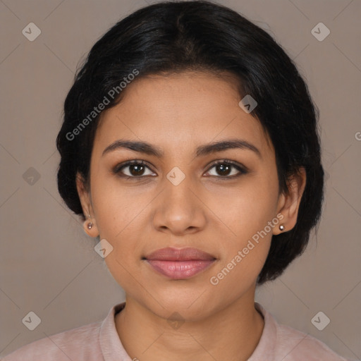 Joyful latino young-adult female with medium  brown hair and brown eyes