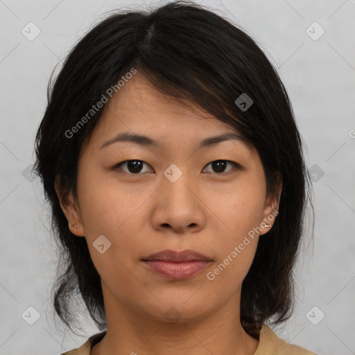 Neutral asian young-adult female with medium  brown hair and brown eyes