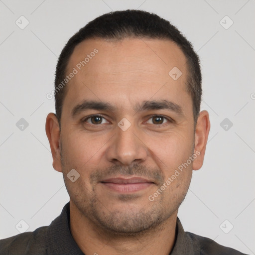 Joyful white young-adult male with short  black hair and brown eyes