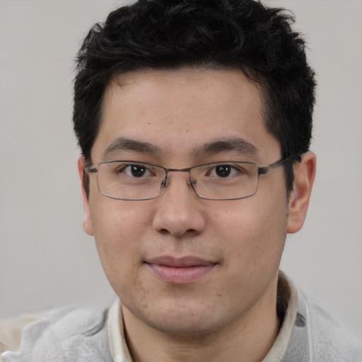 Neutral asian young-adult male with short  brown hair and brown eyes