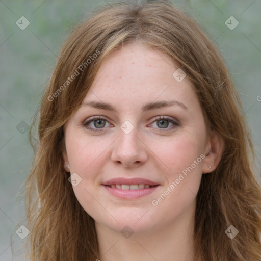 Joyful white young-adult female with long  brown hair and green eyes