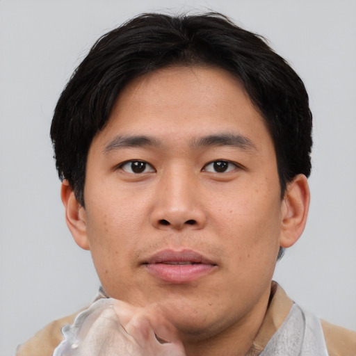 Neutral asian young-adult male with short  brown hair and brown eyes