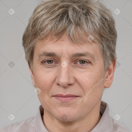 Joyful white adult male with short  brown hair and grey eyes