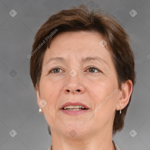 Joyful white adult female with short  brown hair and brown eyes