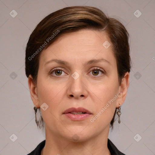 Joyful white adult female with medium  brown hair and grey eyes