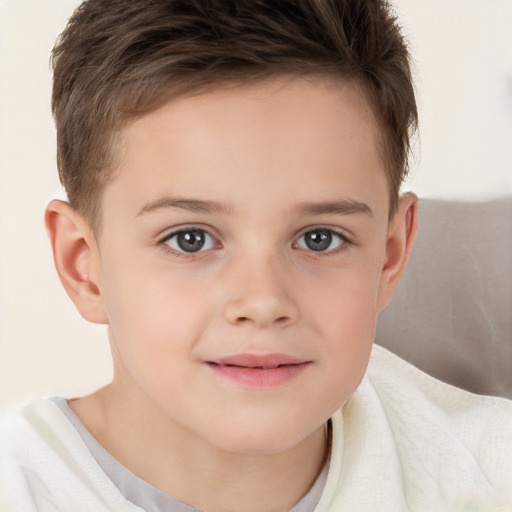 Joyful white child female with short  brown hair and brown eyes