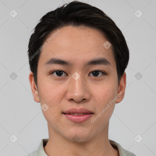 Joyful asian young-adult male with short  brown hair and brown eyes