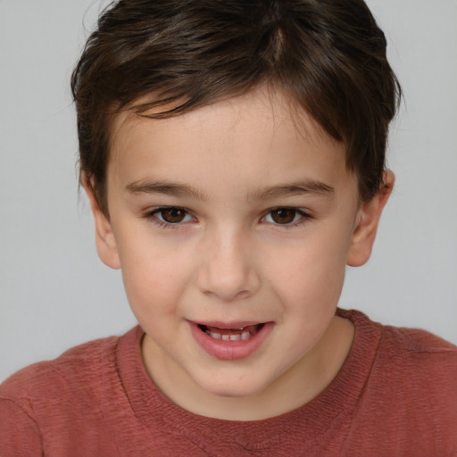 Joyful white child female with short  brown hair and brown eyes