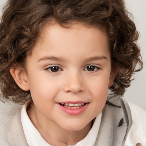 Joyful white child female with medium  brown hair and brown eyes