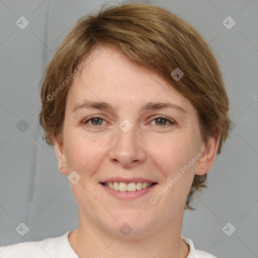 Joyful white young-adult female with medium  brown hair and grey eyes