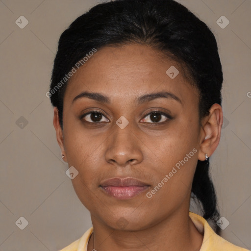 Joyful latino young-adult female with short  black hair and brown eyes