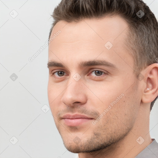 Neutral white young-adult male with short  brown hair and brown eyes