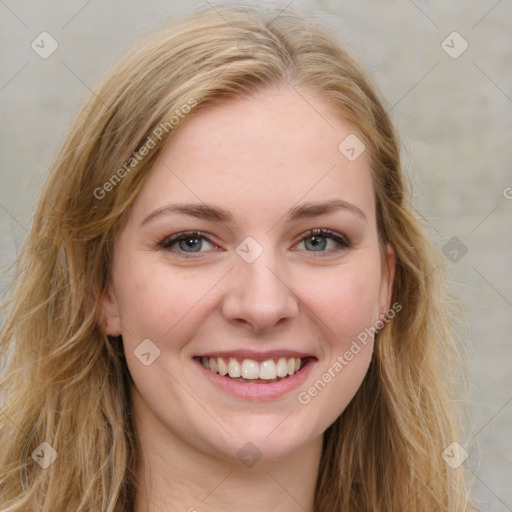 Joyful white young-adult female with long  brown hair and green eyes