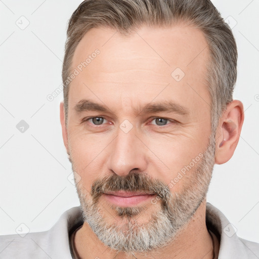 Neutral white adult male with short  brown hair and brown eyes